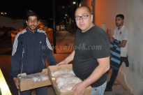  بالصور: السيد بشارة حناوي يتبرع بكمية ضخمة من اللحوم لجمعية يافا للأعمال الخيرية